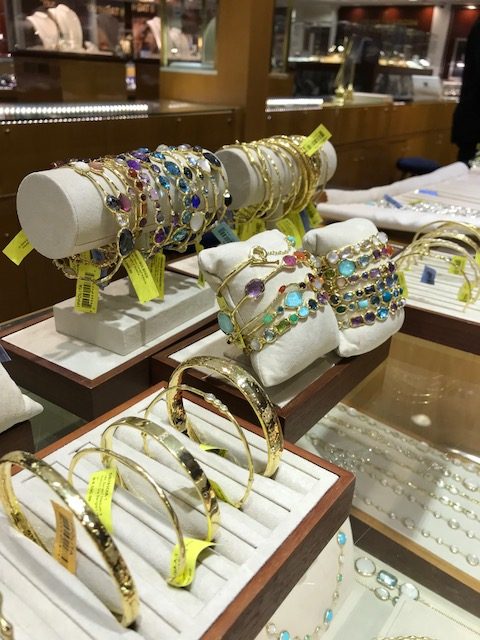 A selection of Ippolita's signature gold and gemstone bangles. 